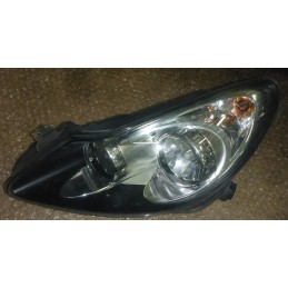 Opel Corsa D Reflektor Lewy...